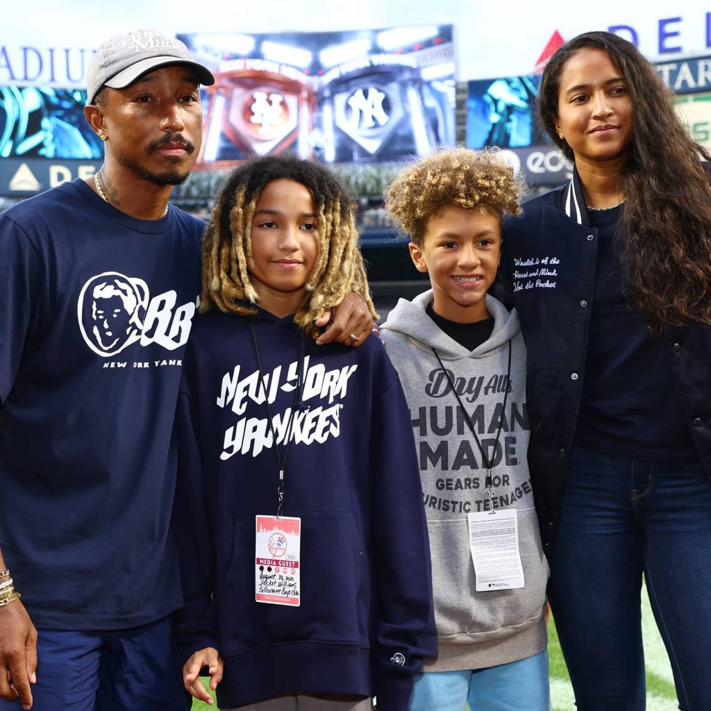 Pharrell Williams Throws First Pitch at Yankees vs. Mets Game – WWD