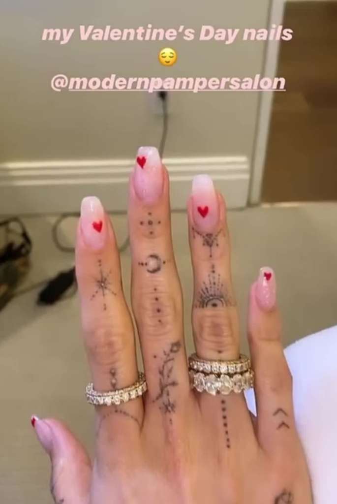 Hailey Bieber nails heart manicure