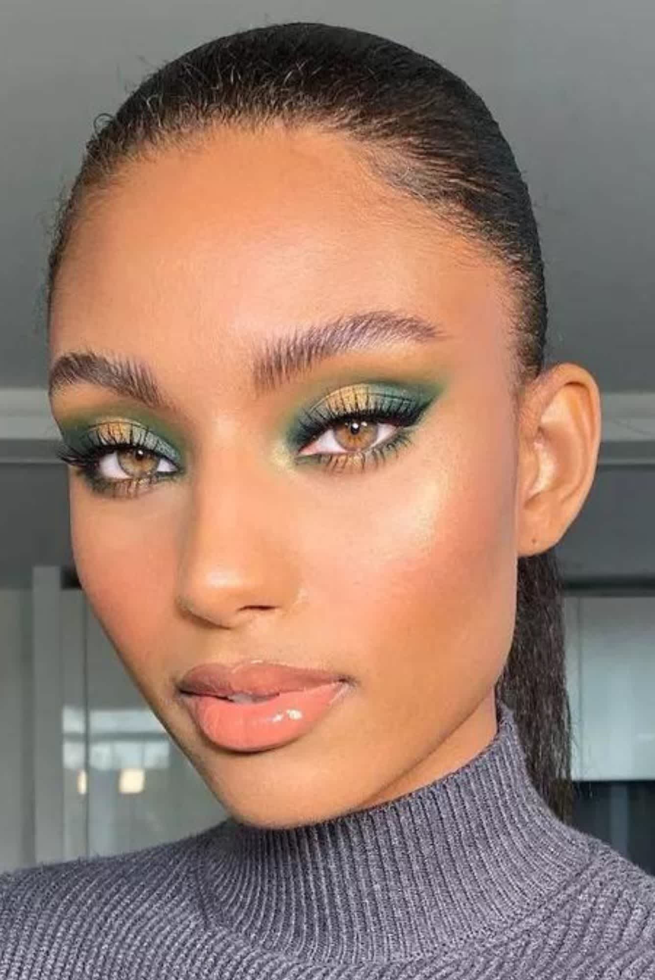 Sydney J Harper uses gold, olive and teal to great a earthy green makeup look
