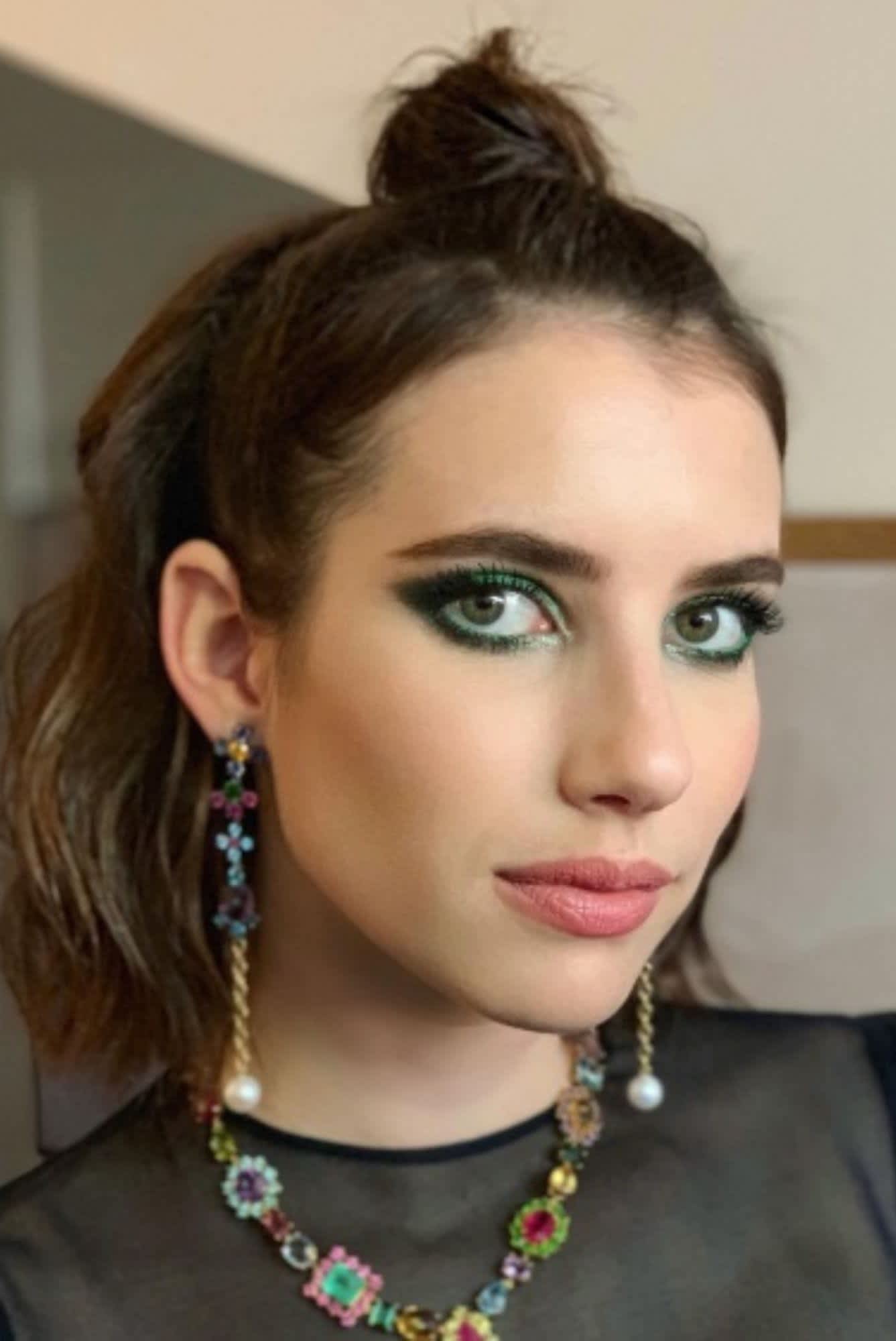Emma Roberts with a emerald green eye makeup by Lisa Eldrdige