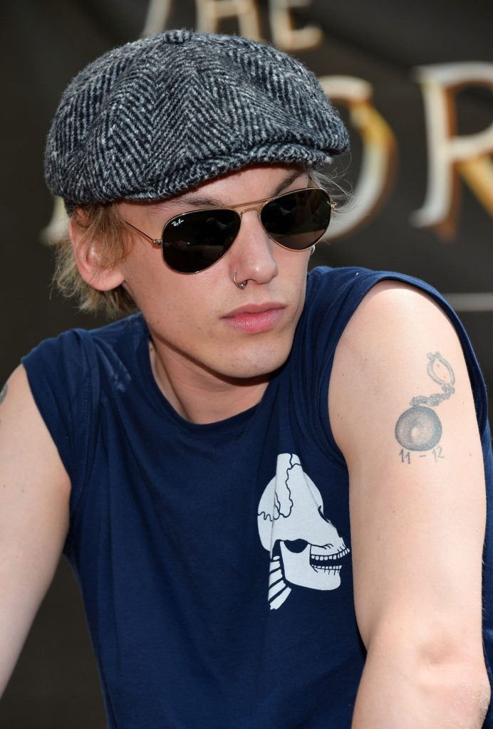 Jamie Campbell Bower's Ball-and-Chain Tattoo