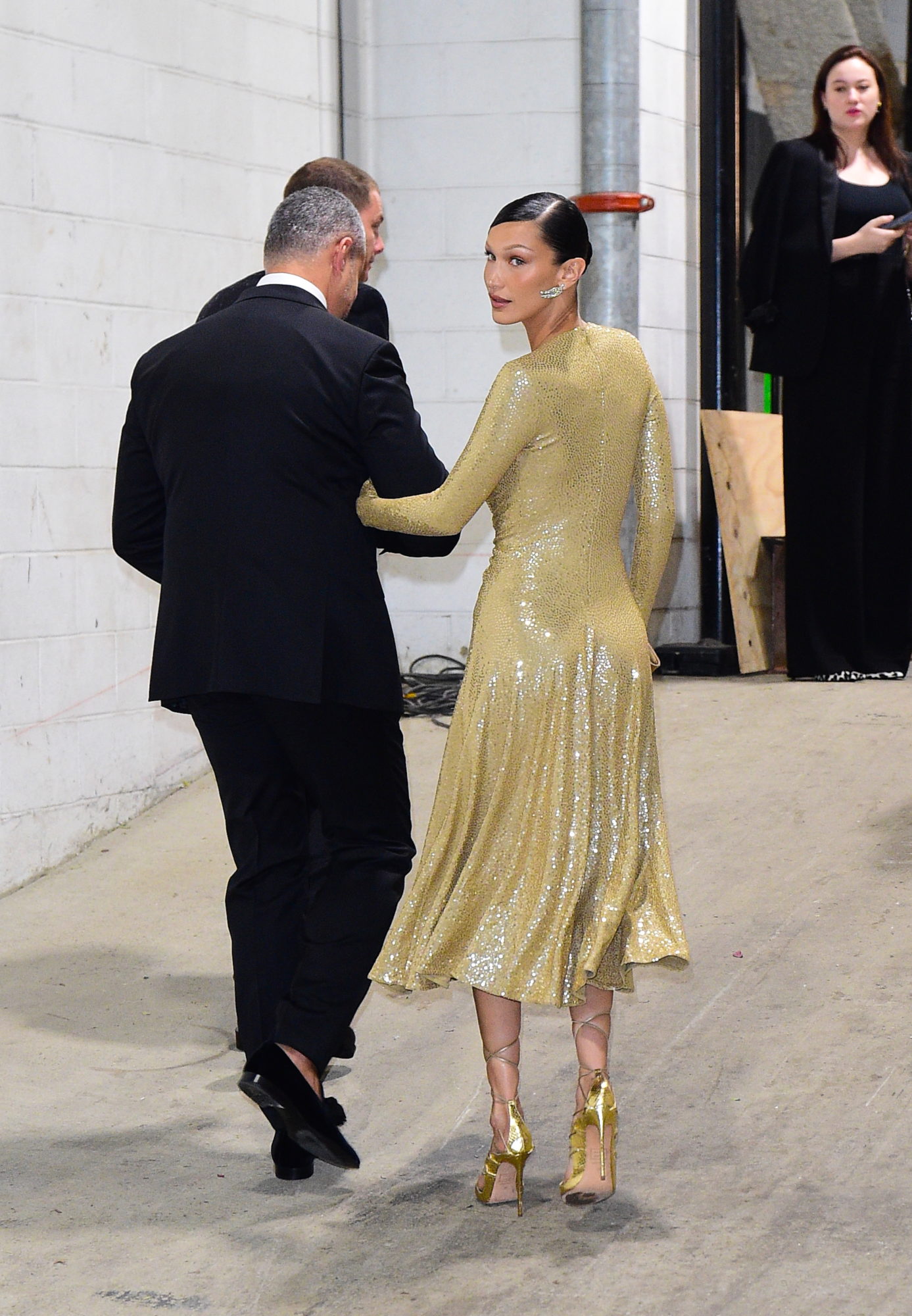 Bella Hadid gave us a lesson in eveningwear in a gold sequin dress