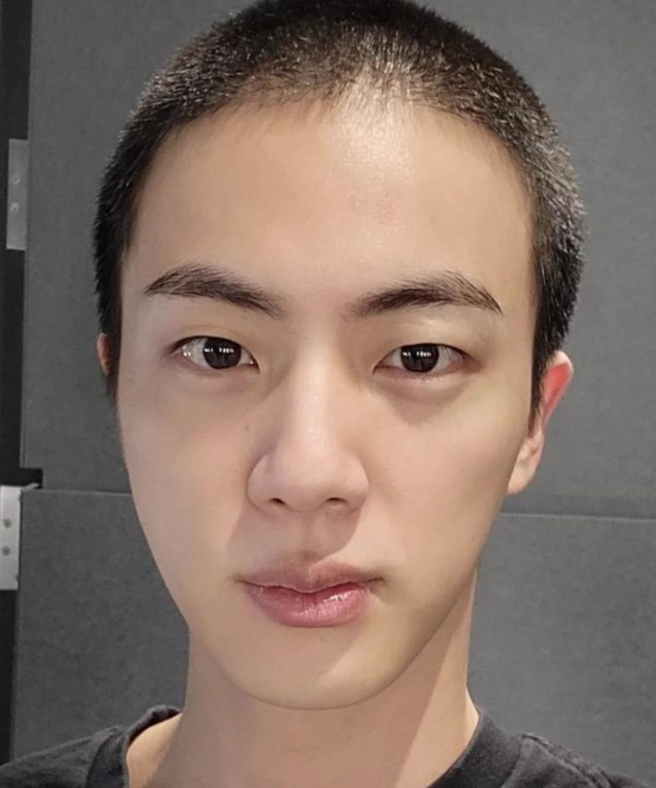 BTS Member Jin Shows Off His New Buzz Cut Ahead of Military Service
