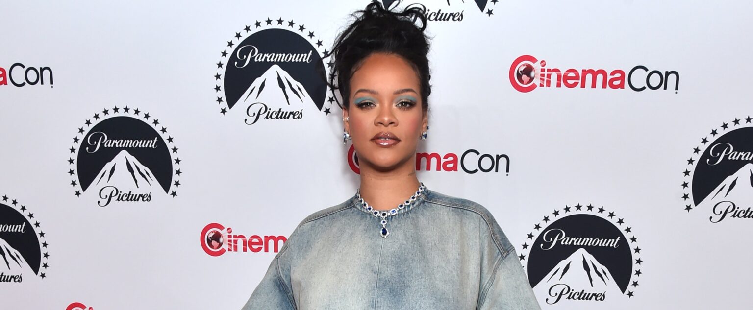 Pregnant Rihanna Cradles Her Baby Bump in Sweet Super Bowl 2023 Photo