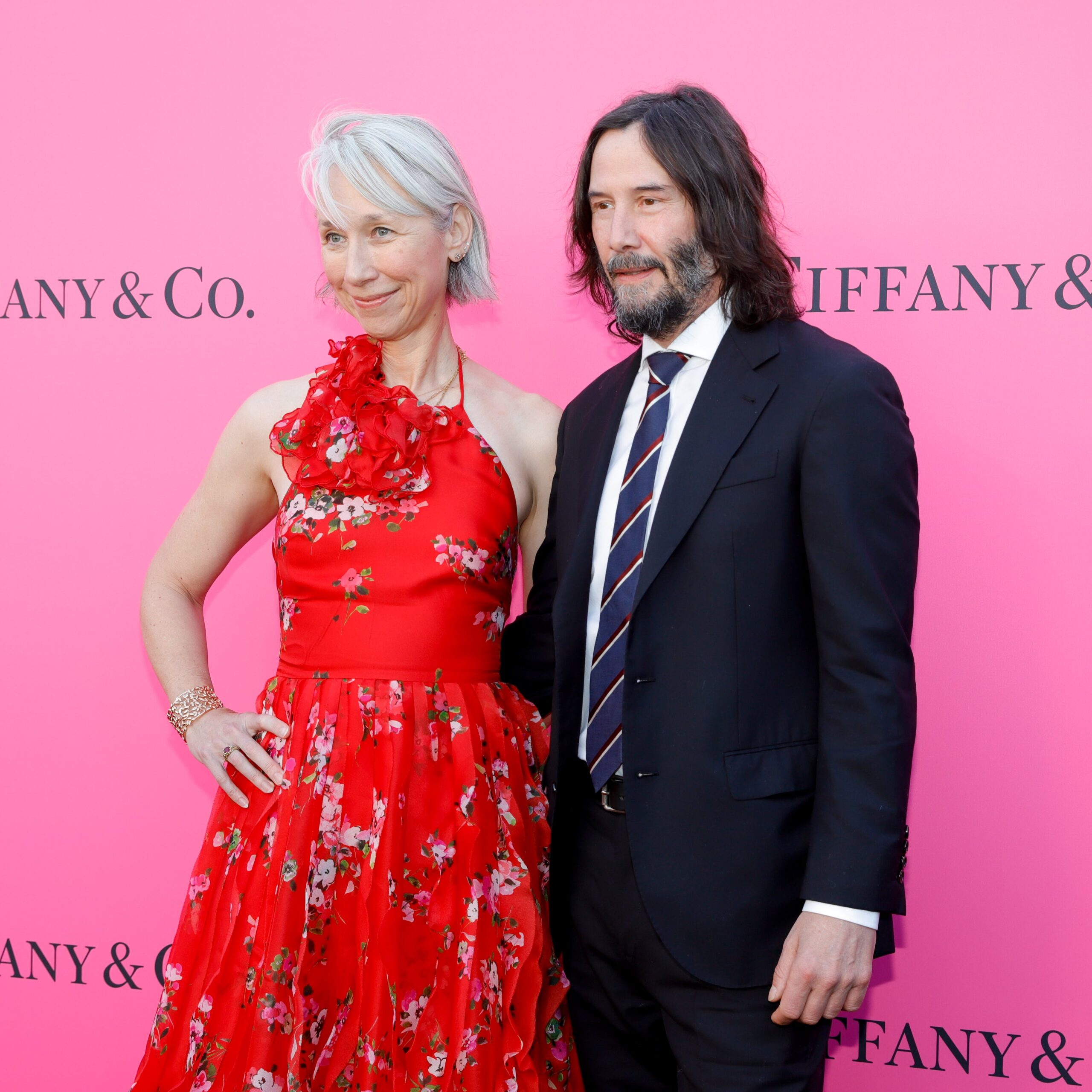 Keanu Reeves and Alexandra Grant Share a Kiss in Rare Red Carpet
