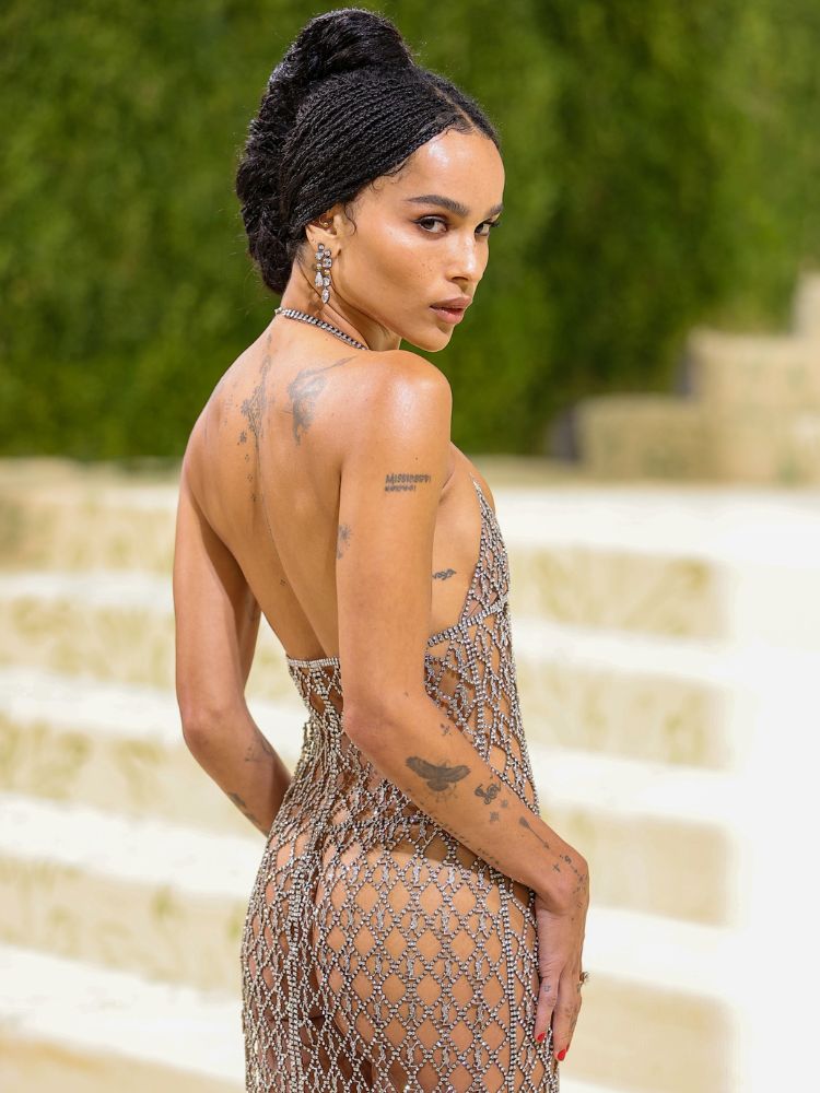 Zoe Kravitz enjoying a sparkling, see through moment on the 2021 Met Gala red carpet. 