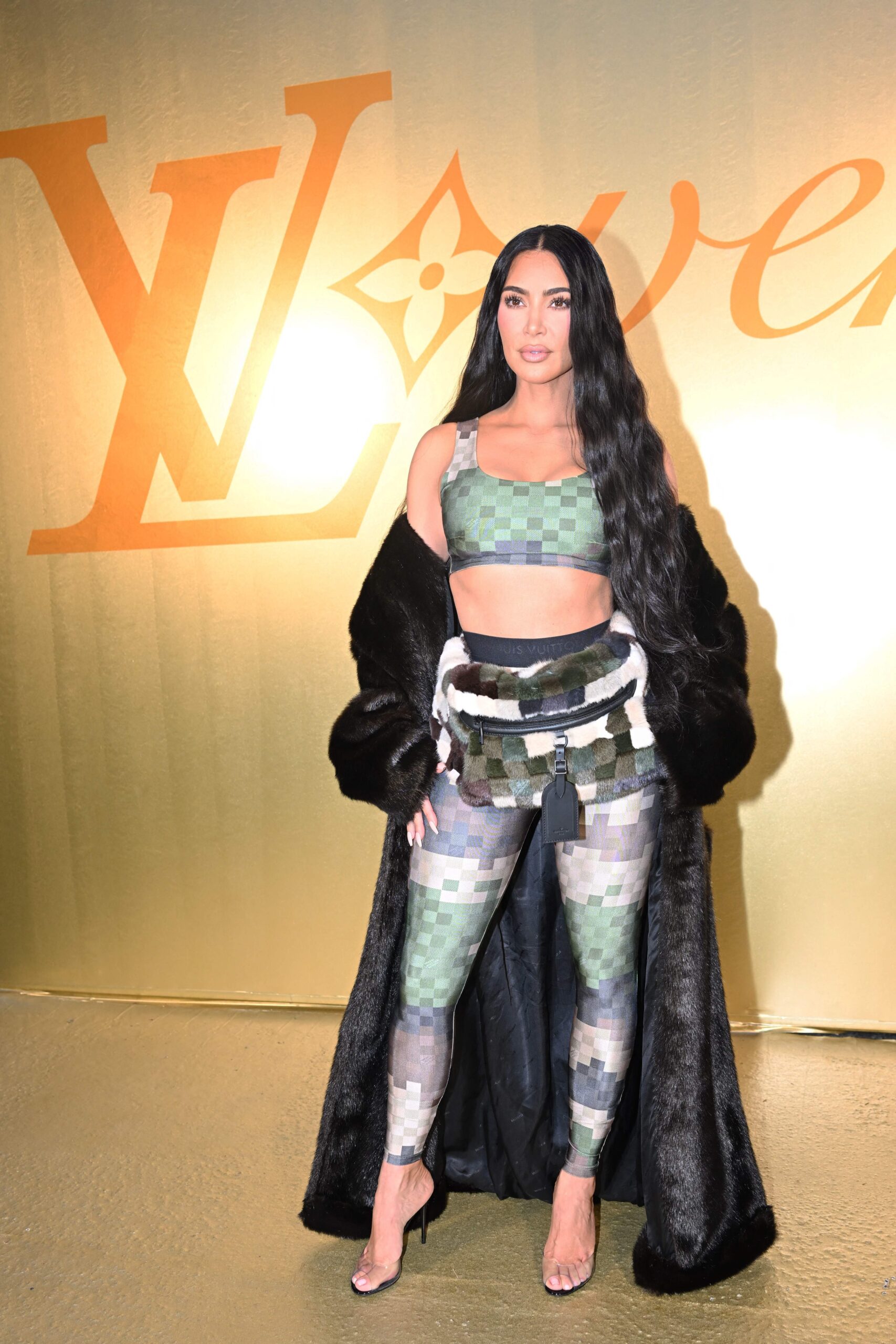 Louis Vuitton Mens Spring 2024 Show, Kim Kardashian Shows Off Her Abs in a  Sports Bra, Leggings, and Heels