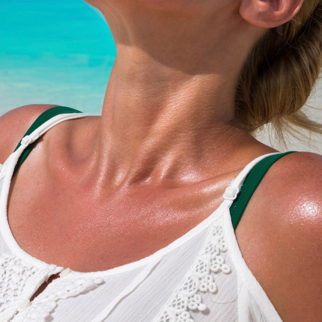 Woman Sunbathing Leaning Back