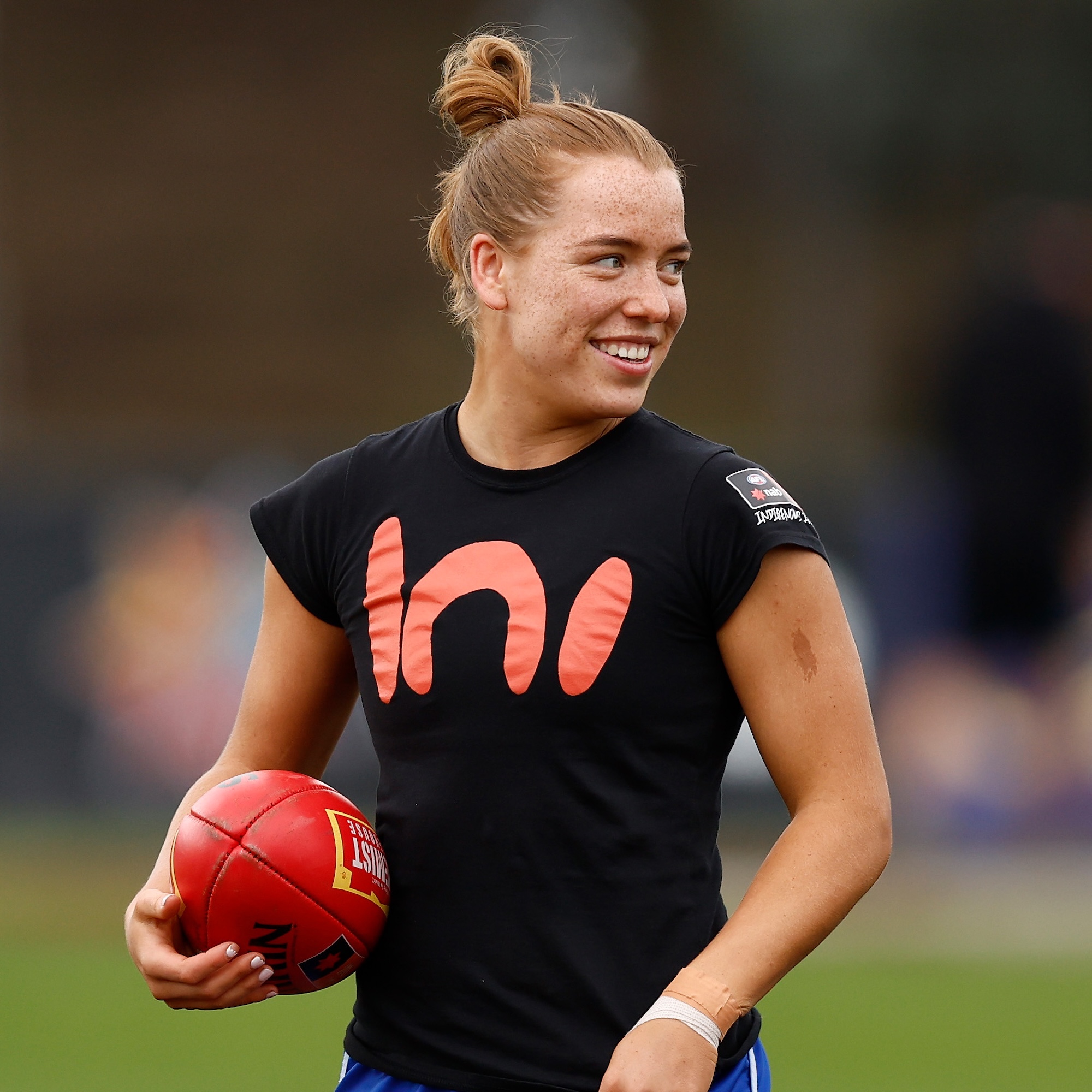 MELBOURNE, AUSTRALIA - OCTOBER 15: Mia King of the Kangaroos looks on during the 2023 AFLW Round 07 match between the North Melbourne Tasmanian Kangaroos and Yartapuulti (the Port Adelaide Power) at Arden St Oval on October 15, 2023 in Melbourne, Australia.